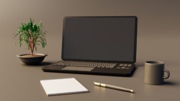 writing tools on a grey table