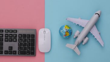 computer keyboard, computer mouse, globe, model airplane