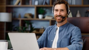 man wearing a headset working from home